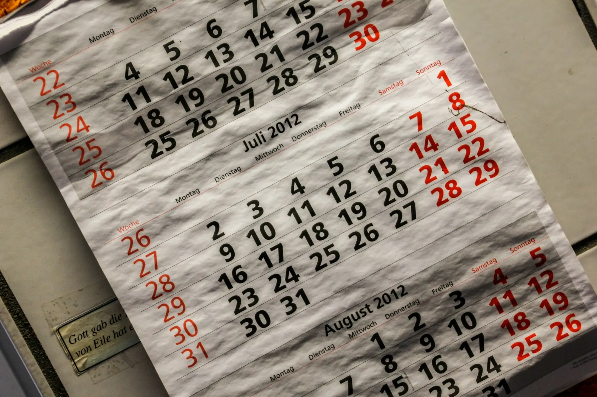 Close-up of calendar pages counting down to a deadline